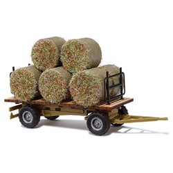 Hay bails on farm trailer